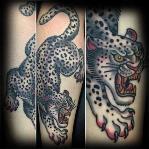 traditional snow leopard tattoo.